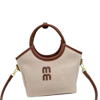 Nova moderna torba s kontrastnim bojama, velika kapaciteta za svakodnevnu upotrebu — bucket bag stil s jednim remenom