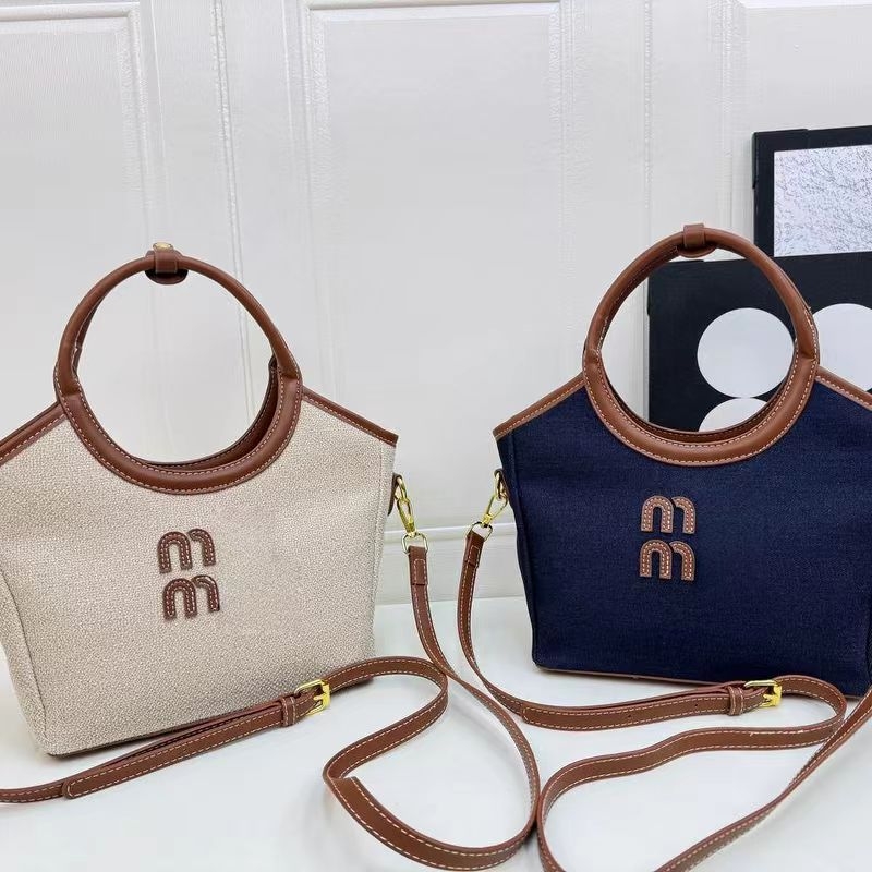 Nova moderna torba s kontrastnim bojama, velika kapaciteta za svakodnevnu upotrebu — bucket bag stil s jednim remenom