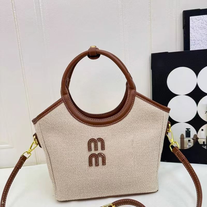 Nova moderna torba s kontrastnim bojama, velika kapaciteta za svakodnevnu upotrebu — bucket bag stil s jednim remenom