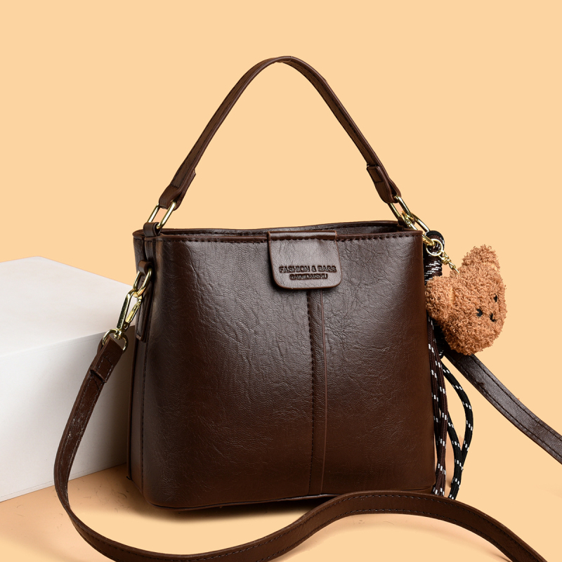 Ženska bucket torba, 2025 novi korejski stil, svestrana torba za ramena, velika kapaciteta, retro crossbody dizajn