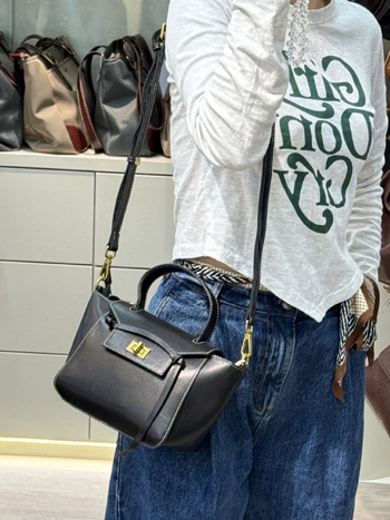 Ženska torbica od prve sloje goveđe kože, oblik mašne, crossbody torba, prava koža, srednje veličine, lagana i moderna