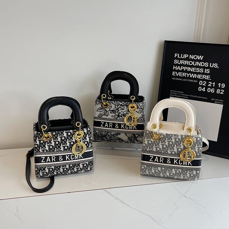 Ženska crossbody torbica s premium teksturom, kvadratnog oblika, PU koža, model 2025