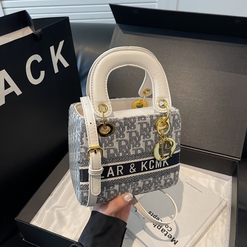 Ženska crossbody torbica s premium teksturom, kvadratnog oblika, PU koža, model 2025