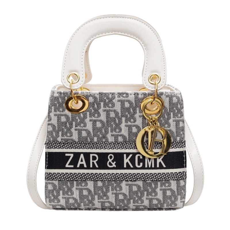 Ženska crossbody torbica s premium teksturom, kvadratnog oblika, PU koža, model 2025