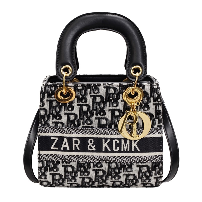 Ženska crossbody torbica s premium teksturom, kvadratnog oblika, PU koža, model 2025