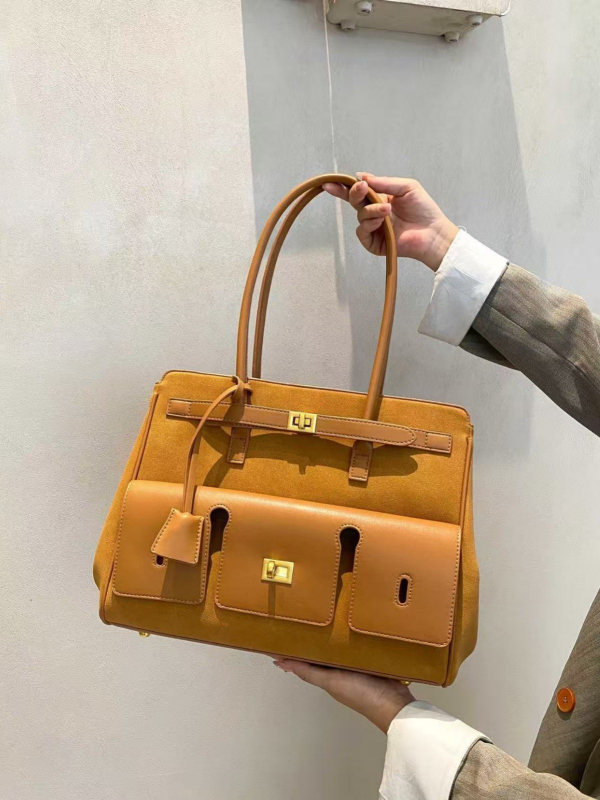 2025 nova mat tote torba, velika kapaciteta, unisex kožna torba za rame s dizajnom krila