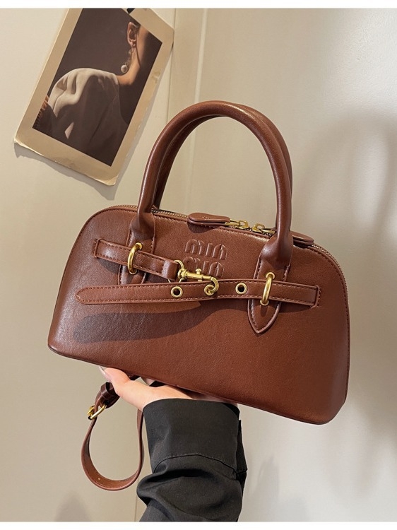 Premium ženska torba Boston, retro stil, dnevna torba za svakodnevnu upotrebu, nišni dizajn, može se nositi u ruci ili preko ramena.