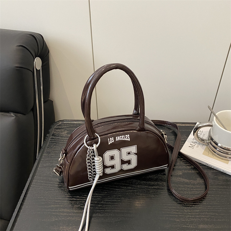 Ženska mala polumjesečna torba, gradski minimalistički stil, dnevna crossbody ili torba preko ramena