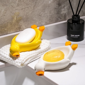 Sapunieră ceramică în formă de rață galbenă, cu drenaj, pentru baie