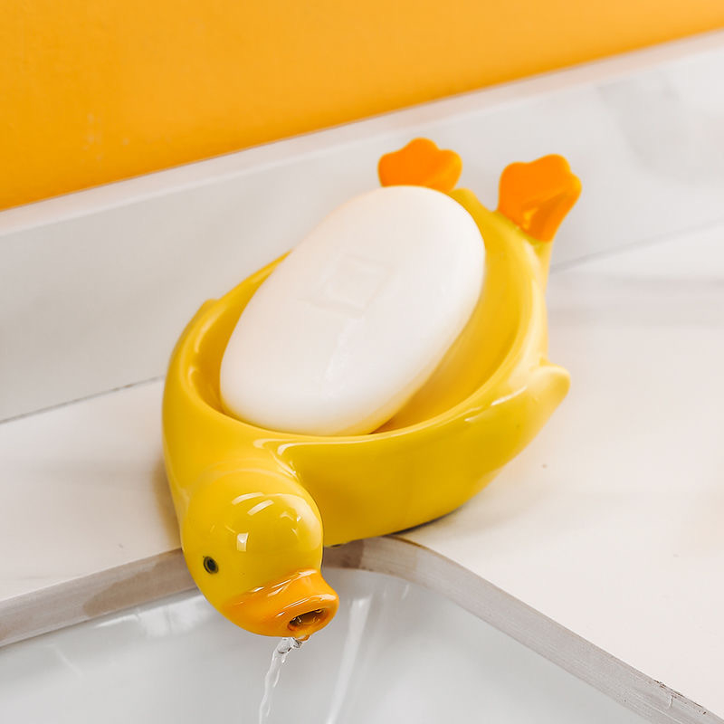 Sapunieră ceramică în formă de rață galbenă, cu drenaj, pentru baie