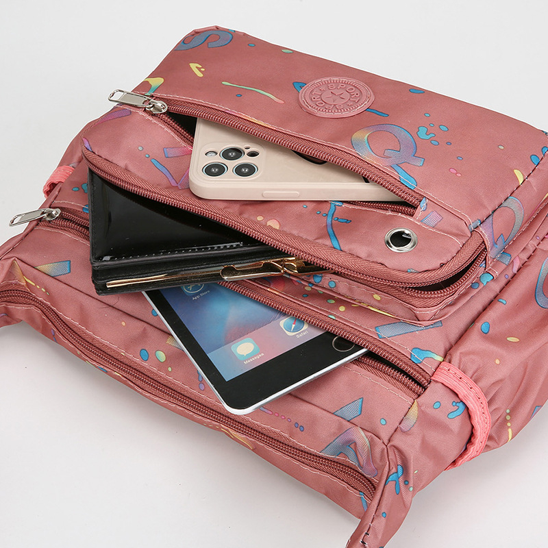 Ženska crossbody torba od Oxford materijala, vodootporna, velika zapremina i više džepova