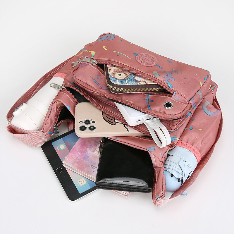 Ženska crossbody torba od Oxford materijala, vodootporna, velika zapremina i više džepova