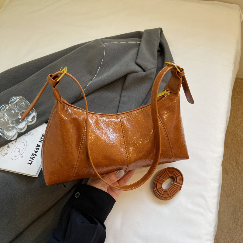 Ženska crossbody torba baguette stila, teksturirana PU, gradski minimalistički dizajn, s džepom na zip, za svakodnevnu upotrebu