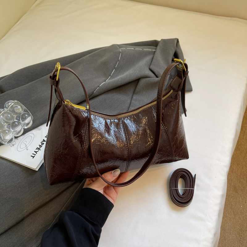 Ženska crossbody torba baguette stila, teksturirana PU, gradski minimalistički dizajn, s džepom na zip, za svakodnevnu upotrebu