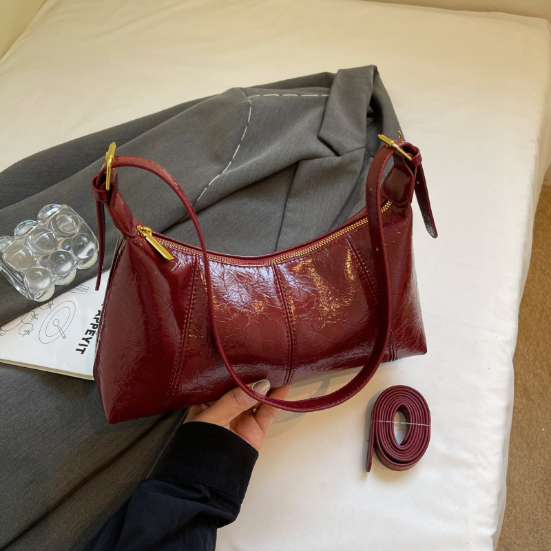 Ženska crossbody torba baguette stila, teksturirana PU, gradski minimalistički dizajn, s džepom na zip, za svakodnevnu upotrebu