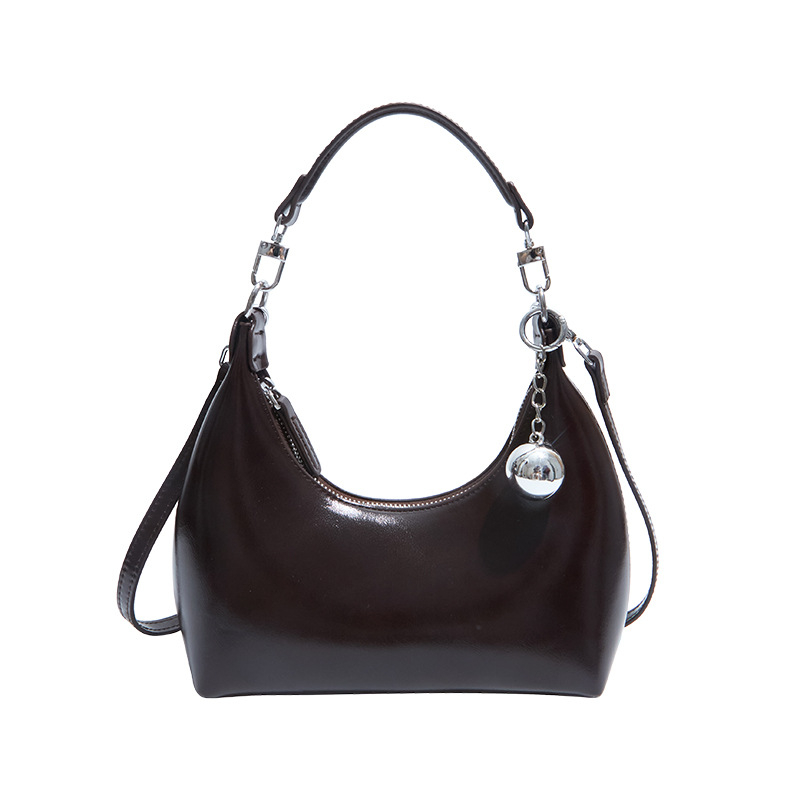 Ženska torbica od vosk kože, mala polukružna forma, crossbody torbica s jednim remenom
