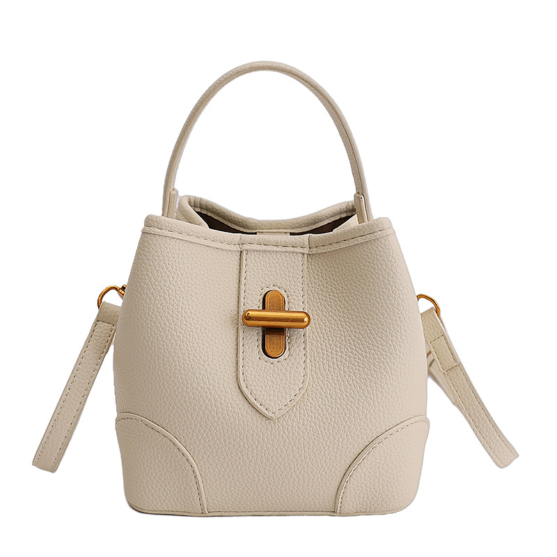PU bucket torba 2026 proljeće, crossbody, ramena i ručka, gradski minimalistički stil, srednja veličina