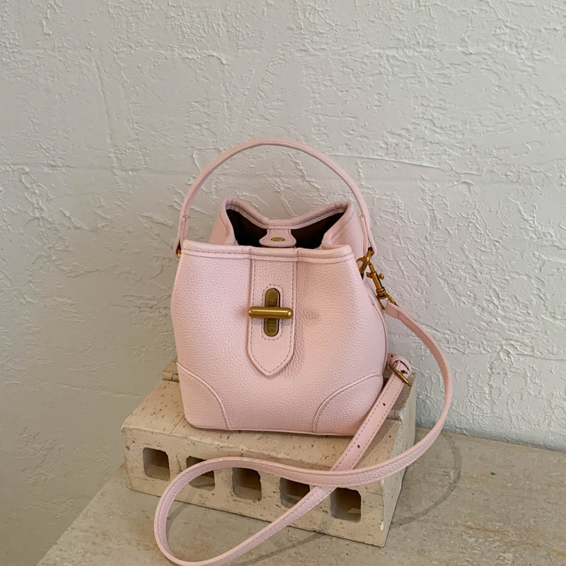 PU bucket torba 2026 proljeće, crossbody, ramena i ručka, gradski minimalistički stil, srednja veličina