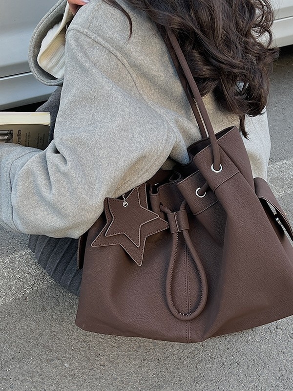 Ženska zimska bucket torba s vrpcom, teksturirana PU, retro niša stil, svakodnevno nošenje preko ramena ili crossbody