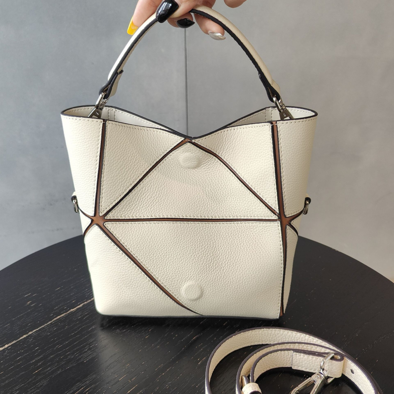 Mala bucket torba od prave kože s dijamantnim geometrijskim siluetom, crossbody s jednom naramenicom, za svakodnevnu upotrebu i posao.