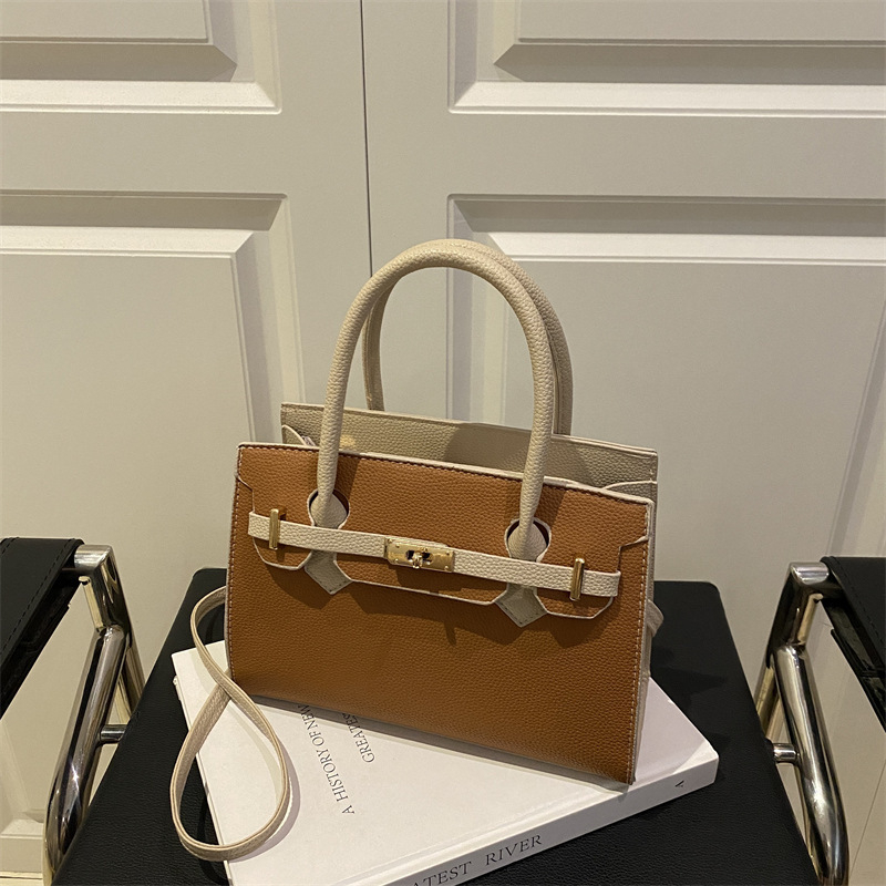 Ženska torbica u korejskom stilu Kelly, minimalistična tekstura, novi model jesen 2025, nišni dizajn, svestrana crossbody torba
