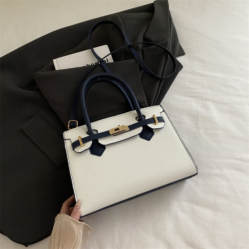 Ženska torbica u korejskom stilu Kelly, minimalistična tekstura, novi model jesen 2025, nišni dizajn, svestrana crossbody torba