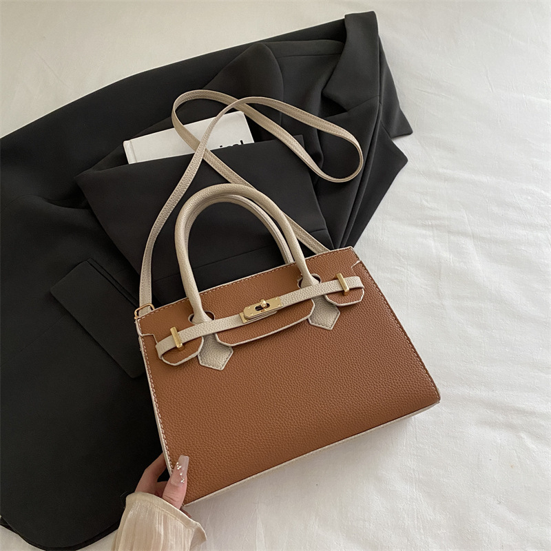 Ženska torbica u korejskom stilu Kelly, minimalistična tekstura, novi model jesen 2025, nišni dizajn, svestrana crossbody torba
