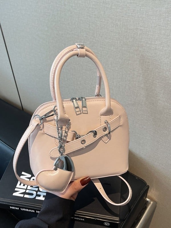 Ružičasta otmjena mala torbica Kelly stila za žene s ručkom i crossbody remenom, 2025 novi model, lagani luksuz, nišni dizajn, visoka kvaliteta