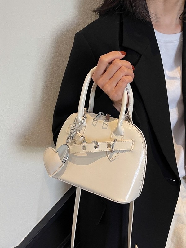 Ružičasta otmjena mala torbica Kelly stila za žene s ručkom i crossbody remenom, 2025 novi model, lagani luksuz, nišni dizajn, visoka kvaliteta