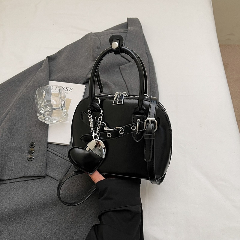 Ružičasta otmjena mala torbica Kelly stila za žene s ručkom i crossbody remenom, 2025 novi model, lagani luksuz, nišni dizajn, visoka kvaliteta