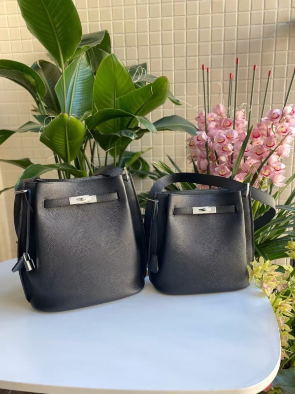 Kelly bucket torba od prvog sloja teleće kože sa širokom naramenicom, crossbody torba s kopčom, tote veličine, retro stil Zapada i Amerike
