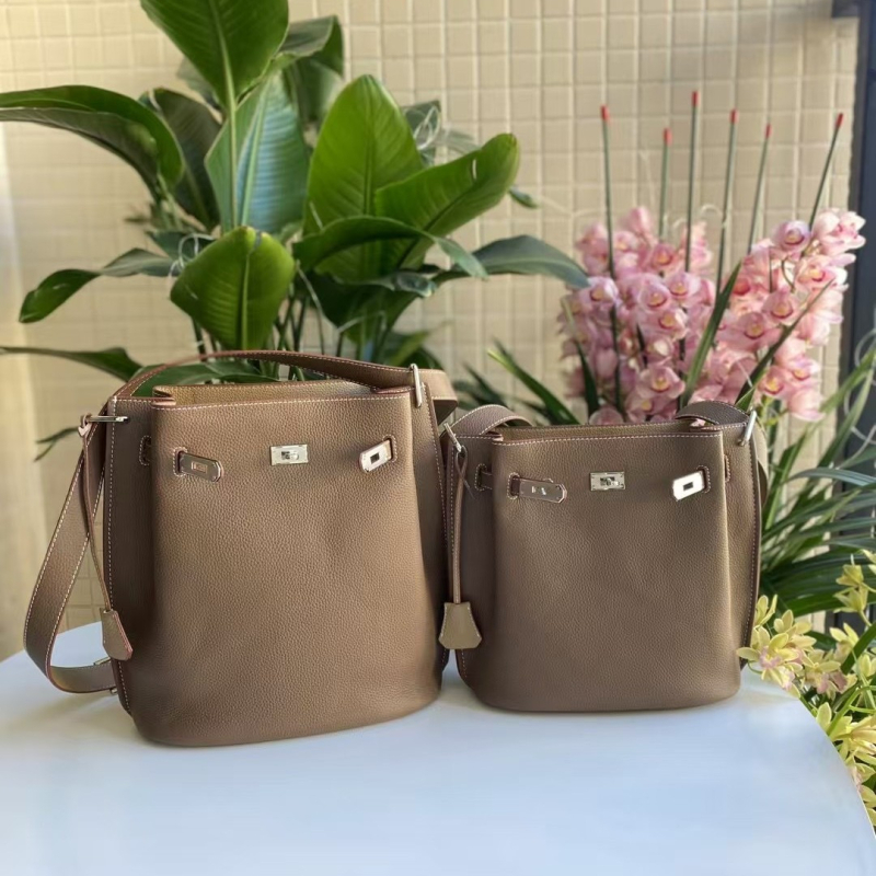 Kelly bucket torba od prvog sloja teleće kože sa širokom naramenicom, crossbody torba s kopčom, tote veličine, retro stil Zapada i Amerike