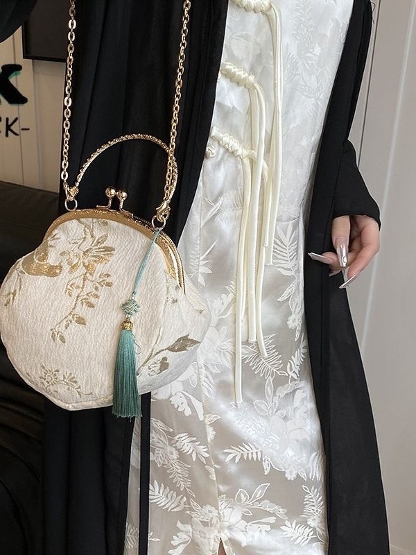 Ženska Hanfu torba u novom kineskom stilu, kompaktna crossbody torba s lancem i strapcima, okruglog oblika