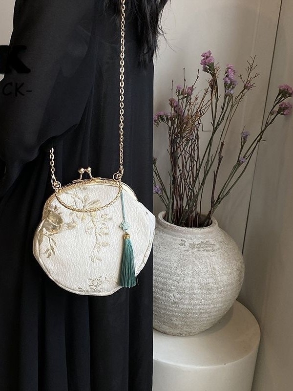 Ženska Hanfu torba u novom kineskom stilu, kompaktna crossbody torba s lancem i strapcima, okruglog oblika