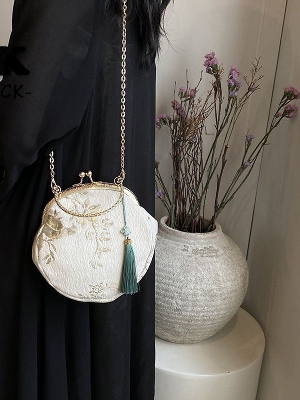 Ženska Hanfu torba u novom kineskom stilu, kompaktna crossbody torba s lancem i strapcima, okruglog oblika