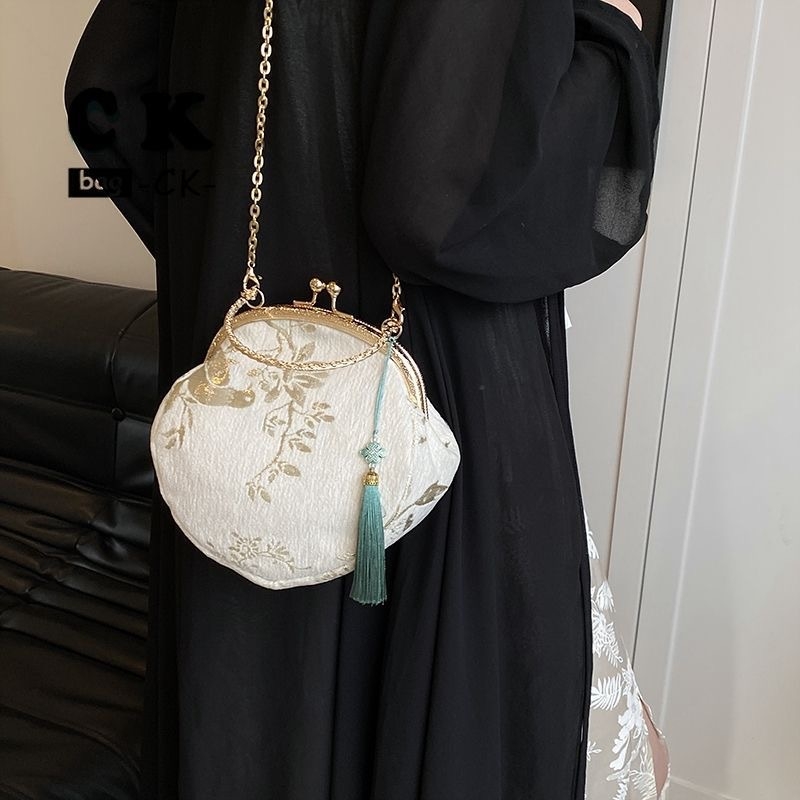 Ženska Hanfu torba u novom kineskom stilu, kompaktna crossbody torba s lancem i strapcima, okruglog oblika