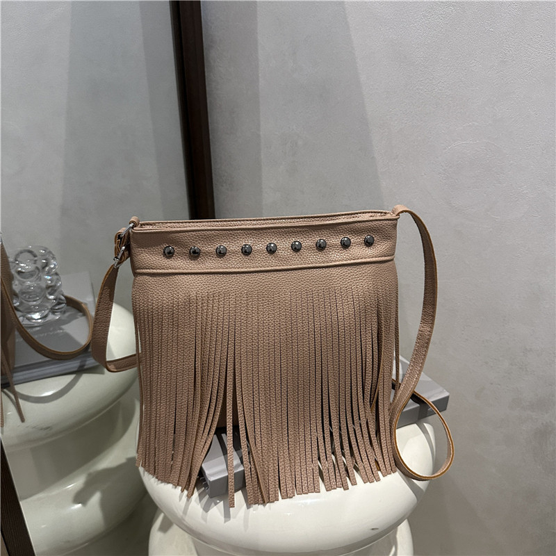 Francuska retro bucket torba s resicama za žene, ljeto 2025, mekana PU koža, crossbody s jednim ramenom