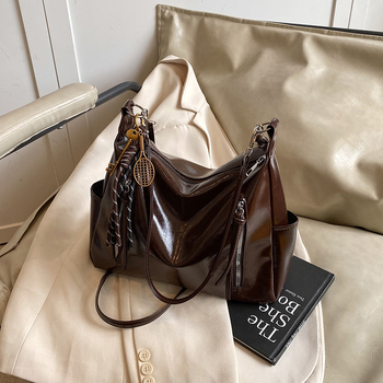 Ženska torba velikog kapaciteta s širokim remenom, crossbody/tote stil, proljeće-ljeto 2025.