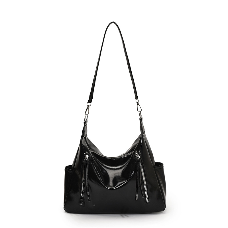 Ženska torba velikog kapaciteta s širokim remenom, crossbody/tote stil, proljeće-ljeto 2025.