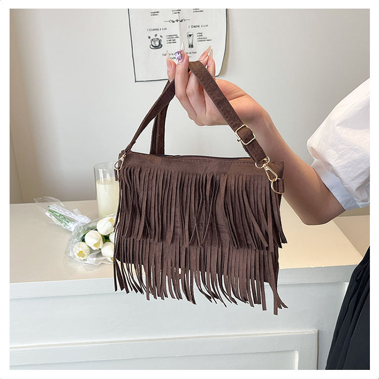 Ženska crossbody torba s resicama, PU koža, 2026 vintage moda, casual gradski stil