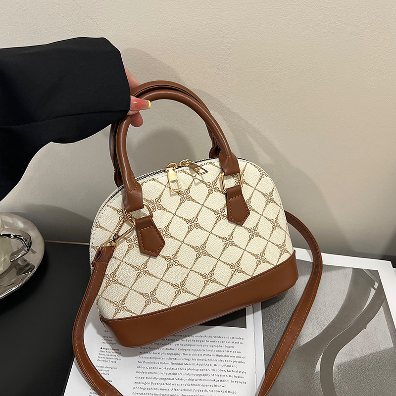 Ženska torbica u obliku školjke, vintage francuski stil, 2025 novi model, hongkonški stil, elegantna crossbody torbica