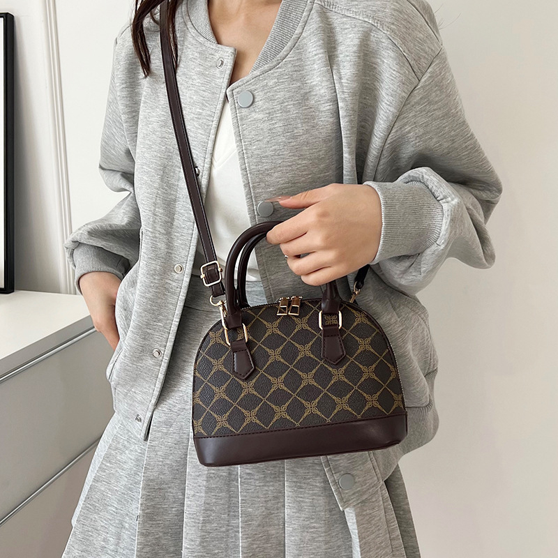 Ženska torbica u obliku školjke, vintage francuski stil, 2025 novi model, hongkonški stil, elegantna crossbody torbica