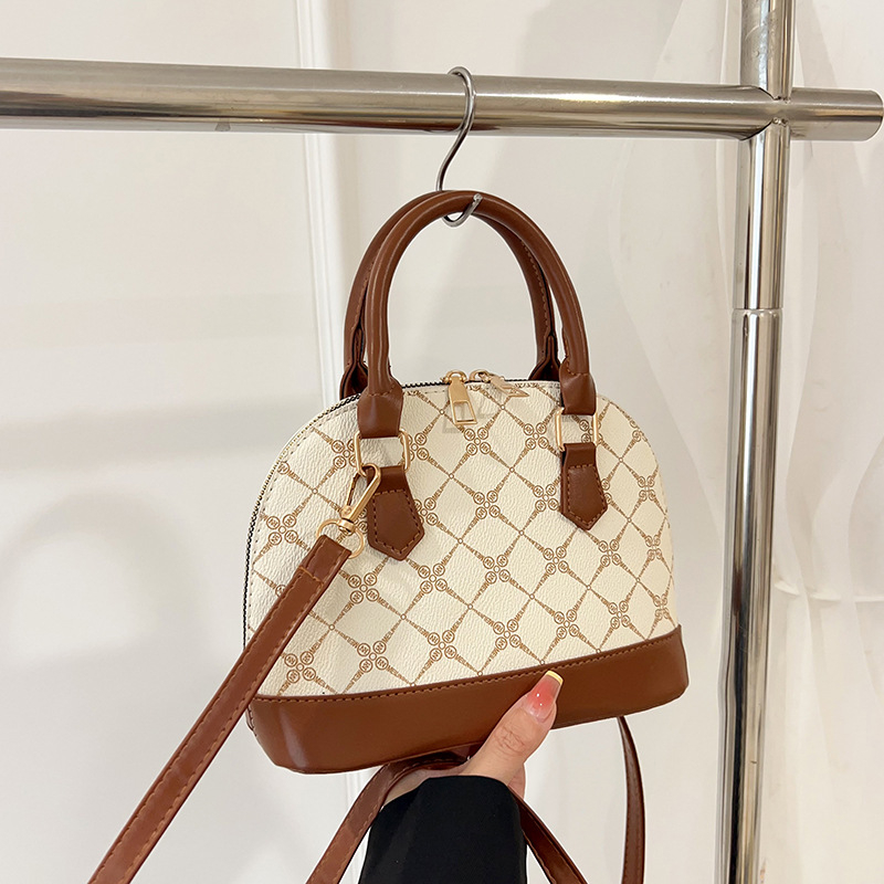 Ženska torbica u obliku školjke, vintage francuski stil, 2025 novi model, hongkonški stil, elegantna crossbody torbica