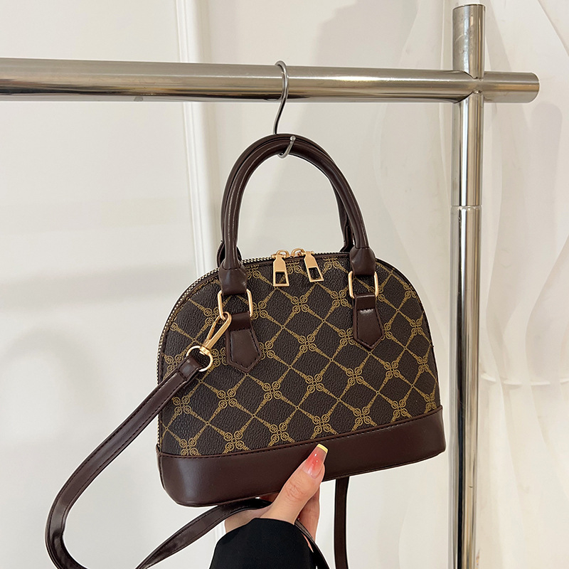 Ženska torbica u obliku školjke, vintage francuski stil, 2025 novi model, hongkonški stil, elegantna crossbody torbica
