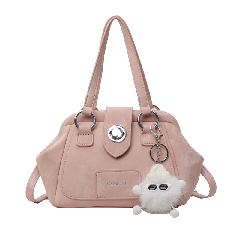 Srednje veličine ženska PU crossbody torba, oblik mušule, jednostavna jednobojna boja, gradski minimalistički dizajn, zatvaranje na zip, unutarnja pregrada sa džepom, poliester podstava, svakodnevna upotreba, proljeće 2026.