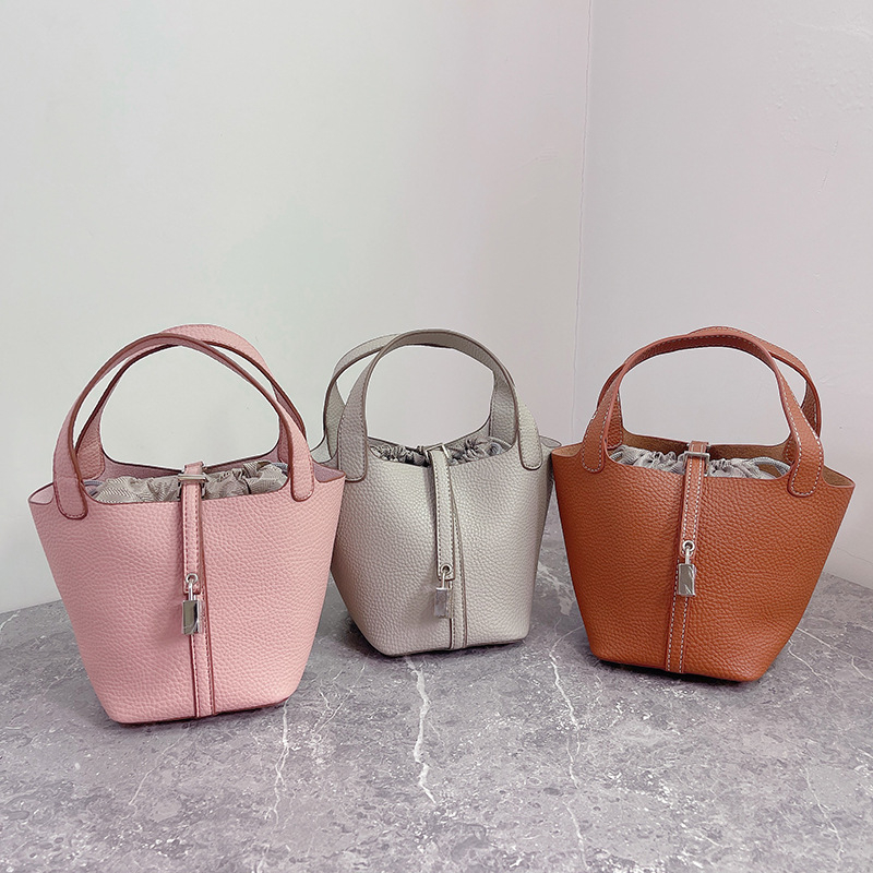 K-stil bucket torbica s lychee teksturom za žena, mini crossbody, model 2025, modnog visokog razreda