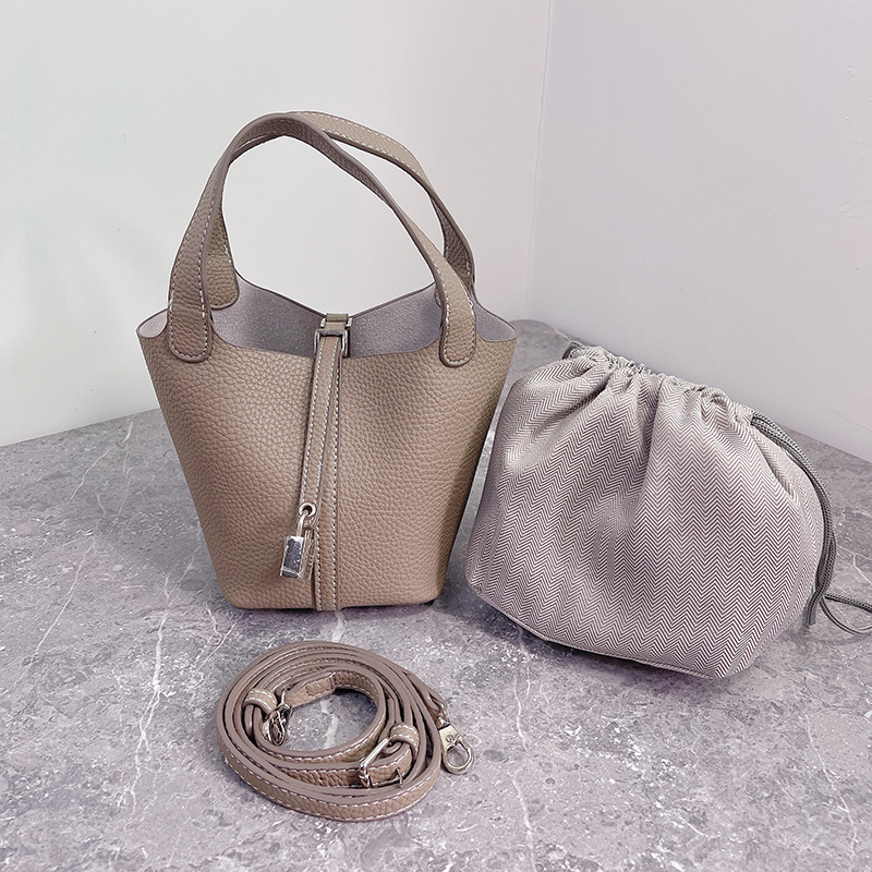 K-stil bucket torbica s lychee teksturom za žena, mini crossbody, model 2025, modnog visokog razreda