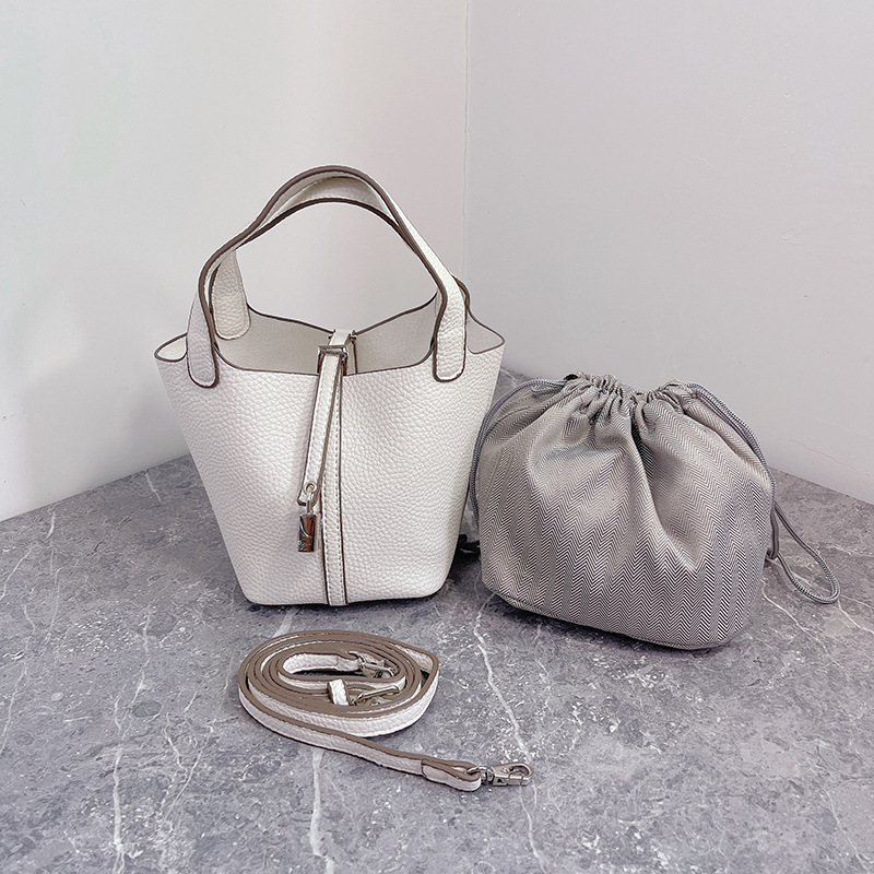 K-stil bucket torbica s lychee teksturom za žena, mini crossbody, model 2025, modnog visokog razreda