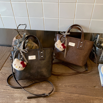 Ženska torba 2025, vrhunska tekstura, nišni dizajn, jesen-zimski retro stil, crossbody bucket torba
