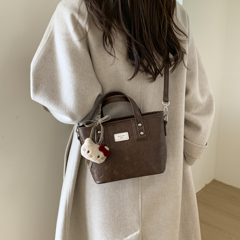 Ženska torba 2025, vrhunska tekstura, nišni dizajn, jesen-zimski retro stil, crossbody bucket torba